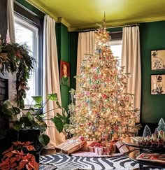 a decorated christmas tree in the corner of a living room with zebra print rugs