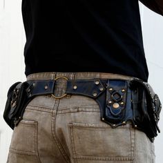 "━━ ━━ The X-belt, made of strong and soft leather. The older it gets, the nicer it becomes! It has 2 big front side pockets which close with zip, and 2 big secret pockets in the back to store your most important belongings. The best accessory to ride your bike, hike the World, dance in festivals or rock your life in total freedom. All our belts are hand made with love and care ♥ ━━ ━━ FABRIC: Leather and brass UNISEX COLORS: Black SIZES: Medium: 82 --> 98 cm, 32.25\" --> 16.25\" Large: 89 Black Leather Belts For Festivals, Black Leather Festival Belts, Steampunk Style Black Belt Bag For Everyday Use, Black Belt With Removable Feature For Festivals, Black Belt Bag With Pockets For Festival, Black Leather Belt For Everyday Use, Black Belt With Belt Clip For Everyday Use, Leather Pocket Belt, Urban Bags