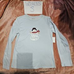 Women's Small (S) Long Sleeve T-Shirt. Brand Is Holiday Editions. Light Blue Colored. Snowman With Snowflakes Graphic. Text Says "Happy Holidays". Christmas / Holiday Themed. Shirt Has Glitter. 60% Cotton, 40% Polyester. If You Have Any Questions Regarding This Item, Please Ask. Cleaning Out Closets, So Please Check Out My Other Listings. I'm Happy To Do Bundles! The More You Buy, The Better The Deals! Embellished Shirt, Long Sleeve Graphic Tee, Red Turtleneck, Layered Long Sleeve, Turtleneck Shirt, Womens Turtleneck, Holidays Christmas, I'm Happy, Shirt Brand