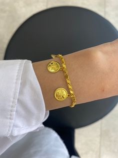 "14K Solid Gold Ottoman Monogram Bracelet / Turkish Embossed  Coin  Bracelet / Ottoman Sign Pressed Disc Bracelet * Gold KT: 14K Solid Gold * Gold Color: Dark Yellow Gold (The colors are exactly the same as in the photo) * Chain Lengths: 6\"-8\" Follow on Instagram - @bayargold.tr My Web Site - https://www.bayargold.com * Bayar Gold is a fine jewelry company. Please do not hesitate to ask us questions. We are always here to help you. * All items are packed in the high-quality jewelry box. The gift message is available. Please let us know what to write by leaving us a note at checkout.  * Gift wrapping available.  Express shipping * United States: 4-6 business days * Canada: 4-6 business days * Europe: 4-6 business days * Australia: 4-6 business days * UK: 4-6 business days * Worldwide: 2-7 Albanian Gold Jewelry, Coin Bracelet Gold, Turkish Gold Jewelry, Gold Coin Bracelet, Turkish Bracelet, Gold Ottoman, Photo Chain, Tiny Heart Necklace, New Gold Jewellery Designs