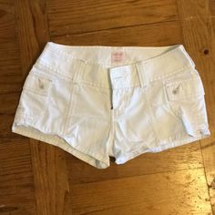 Abercrombie & Fitch Shorts White Pockets On The Side Size: Looks Like 00 But Not Positive Never Worn Excellent Condition White Fitted Jean Shorts With Pockets, Fitted Mid-rise Cotton Shorts, White Jean Shorts With Pockets, White Mid-rise Shorts With Pockets, Abercrombie And Fitch Shorts, Shorts White, On The Side, Abercrombie Fitch, White Shorts