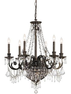 a chandelier with crystal drops hanging from it's center and four arms