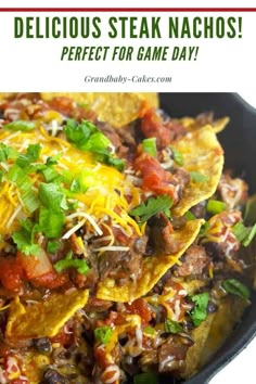 a black plate with nachos and cheese on it that says delicious steak nachos perfect for game day