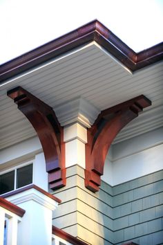 the corner of a house with wood trim