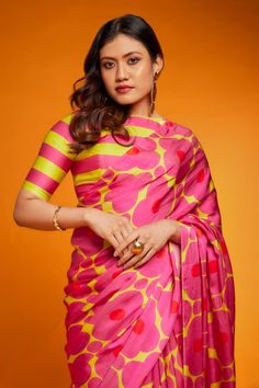 Yellow satin silk saree with all-over big pink floral printed motifs. Comes with yellow-pink striped blouse. - Aza Fashions Semi-stitched Silk Pre-draped Saree For Navratri, Printed Motif Saree Blouse For Puja, Pre-draped Silk Saree With Semi-stitched Blouse, Pre-draped Silk Saree With Semi-stitched Unstitched Blouse, Printed Saree Blouse Piece For Puja, Bollywood Blouse Piece With Printed Motifs For Diwali, Bollywood Style Blouse With Printed Motifs For Diwali, Bollywood Style Silk Saree With Printed Motifs, Silk Pre-draped Saree With Printed Motifs