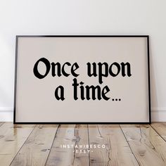 a black and white sign that says once upon a time