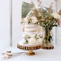 a wedding cake sitting on top of a table