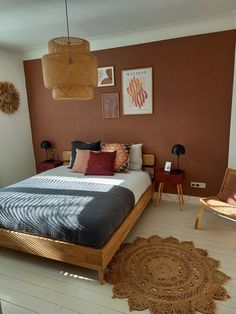 a bedroom with brown walls and white flooring has a large bed in the center