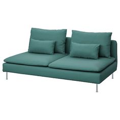 a green couch with pillows on it and some metal legs in front of white background