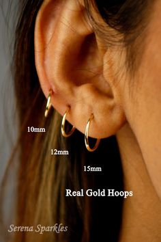 10k Solid Gold Continuous Hoops Available in Three Different Small Sizes 10mm, 12mm, 15mm. These Are Real Gold Daily Wear Sleeper Hoop Earrings For A Minimalist Look. Everyday Dainty Solid Gold Hoop Earrings Can Be A Perfect Gift For Your Loved Ones. Each Earring Is Stamped 10k To Prove Its Authenticity. Metal: Solid Gold Gold Purity: 10k Stamp: 10k Made : Made In Italy Thickness : 1.2 mm (All Are Equal In Thickness) Piercing Post Gauge : 0.6mm   PURCHASING OPTIONS  Single Piece - Refers to 1 in Real Gold Hoop Earrings, Geek Jewelry, Dragon Jewelry, Eco Friendly Jewelry, Nose Stud, Jewelry Inspo, Gold Hoops, Earrings Etsy, Jewelry Earrings Hoops