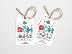 two tags with the words have a doh lightiful christmas written on them