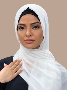 Our Luxury Chiffon hijab-Pearl White is perfect for every occasion. With the softest chiffon fabric we could find, our Luxury Chiffon will become your go to hijab whether you're going out to a fancy party or keeping it casual, looking beautiful is effortless! Fabric: Polyester Chiffon Dimension: 70" x 27" Contour: Long Rectangle Thickness: Light Texture: Smooth Care: Machine or hand wash in warm water, tumble dry or air dry, iron if needed. African Turban, Turban Hijab, Hijab Designs, Chiffon Hijab, Cream Blouse, Fancy Party, Chiffon Scarf, Light Texture, Fine Fabric