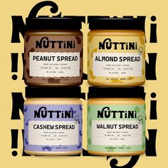 four jars of nuttin peanut spread sitting on top of each other in front of a black and yellow background