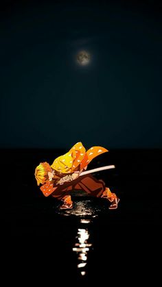 a person on a boat in the water at night with a full moon behind them