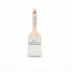 a paint brush with a wooden handle on a white background