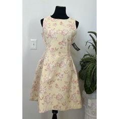 N7/W13/32723) Nwt Eva Mandes Ny&C Women's Sleeveless Yellow Floral Curvy Fit Flare Dress Sz 10. Back Zip Closure. Inner Lining. New With Tags. Please Zoom To See Details As They Are Important Part Of The Description. Don’t Forget To Check Out Other Items In Our Store! Happy Shopping! Approx Measurements: Chest (Pit To Pit): 19" Waist (Across): 17" Length (Shoulder To Bottom): 37" Beige A-line Sleeveless Dress For Spring, Elegant Yellow A-line Sleeveless Dress, Sleeveless Beige Floral Print Dress, Fitted Yellow Sleeveless Dress, Fitted Sleeveless Beige Dress For Spring, Fitted Beige Sleeveless Dress For Spring, Spring Fit And Flare Sleeveless Dress, Beige Fitted Sleeveless Dress For Spring, Yellow Floral Print Sleeveless Party Dress