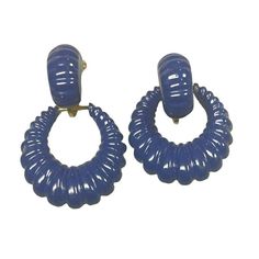 These vintage royal blue clip-on hoop earrings exude a timeless charm. Perfect for adding a touch of retro elegance to your ensemble. * Clip-on closure * Hoop design * Vibrant blue color * Vintage aesthetic * Lightweight for comfort Can wear clip on portion alone or with hoop. Approximately 1.25 inches in diameter. Blue Retro Clip-on Jewelry, Vintage Blue Clip-on Earrings, Retro Clip-on Hoop Earrings, Hoop Design, Color Vintage, 80s Retro, Vibrant Blue, Gold Enamel, Jewelry Earrings Hoops