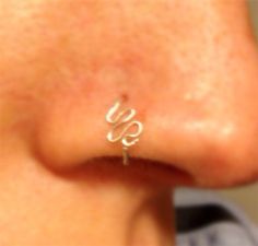 This is a 22 or 20 gauge silver nose ring, that will be made to order in the metal of your choice, 14k gold fill (rose or yellow) and sterling silver. 22 gauge is thinner (0.6mm ) and 20 gauge is slightly thicker measuring 0.8mm thick. Please measure your nose hoop or piercing to ensure you order the correct diameter (how high your piercing is on your nostril.) If you need help, see below: *SIZING* Here's a link to my website that has instructions for sizing: http://www.bijoufish.com/what-size-n Cool Nose Piercings, Nose Cuffs, Double Nose Ring, Nose Cuff, Nostril Ring, Nose Rings Studs, Piercing Nose, Silver Nose Ring, Gold Nose Rings