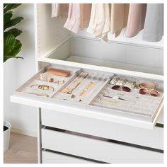 the drawers are organized and ready to be used for storing jewelry, bracelets, and other personal items