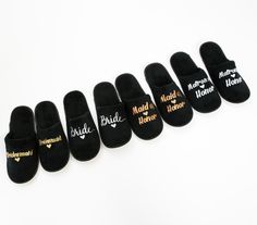 six pairs of slippers with the words bride and maid written on them in different languages