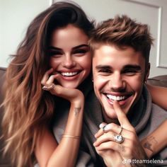 a man and woman are smiling while they pose for a photo together with their hands on their chins