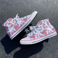 Take a look at these elegant rose cluster wedding flower themed floral print white high top converse. Perfect for your big day or any other day in general. Tie the knot in more ways than one. We buy each pair of shoes BRAND NEW. Each pair is made to order, please make sure you put in the correct shoe size before you check out. The ink is permanent and will never come off, fade away, or peel off. Made in the USA. This price includes everything: shoes, artwork, and shipping. Thanks for stopping by White High-top Sneakers With Floral Print, Custom Slip On Vans, Wedding Shoes Sneakers, Hi Top Converse, Converse Wedding Shoes, Custom Wedding Shoes, White High Top Converse, Red Rose Wedding, Low Top Converse