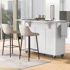 a kitchen island with two bar stools next to it in front of a window