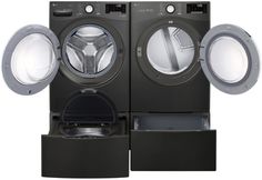 the front load washer and dryer are stacked on top of each other with their doors open