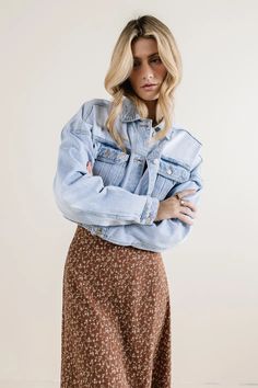 Shop Our New Light Wash Cropped Denim Jacket. Designed with a Collared Neck, Long Sleeves with Button Cuffs, and Two Buttoned Pockets. Fuzzy Skirt, Denim Jacket Outfit, Denim Sweater, Jacket Outfit, Waffle Knit Top, Cropped Denim Jacket, Loungewear Sets, Stripe Skirt, Bag Dress