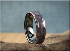 "This is a beautiful, handcrafted Artisan ring made in my small shop in Ottawa, Ontario, in Canada. This design features a beautiful Turkish Purple Jade inlay on a hammered tungsten carbide comfort fit core. Widths of 6mm or 8mm are available. US full and half ring sizes from 5 - 13 are available. If you require a custom order at a different size, please send me a message and I will do my best to accommodate.  NOTES: Shown in 6mm comfort fit width. A luxurious, solid Walnut box with shop logo is available at a bundled discount, or as a separate presentation upgrade here: https://www.etsy.com/ca/listing/1227551836/solid-black-walnut-ring-presentation-box IMPORTANT - RING SIZING: Please be certain to have your ring size checked professionally by a jeweler (usually a complimentary service) to Round Rings With Inlay Perfect For Gifts, Gift Round Ring With Inlay, Channel Ring, Printable Ring Sizer, Antler Ring, Ottawa Ontario, Purple Jade, Artisan Rings, Ring Sizer