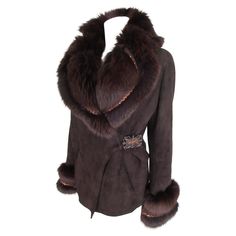 This jacket is made of soft brown tuscany lamb shearling with fox fur We offer more exclusive fur /winter items, view our frontstore. Details: Made of brown soft quality shearling with soft brown fox fur embroidered with bronze color sequins 2 pockets and a attached and inside belt Huge collar The size is medium/large See section measurements. Please note that vintage items are not new and therefore might have minor imperfections. Shearling Leather Jacket, Nepo Baby, Winter Items, Boho Lifestyle, Soft Brown, Fox Fur, Bronze Color, Jacket Coat, Toscana