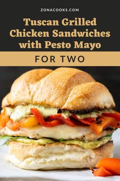 a grilled chicken sandwich with pesto mayo and carrots