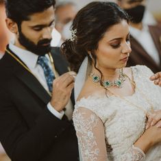 a bride and groom are getting ready for their wedding ceremony