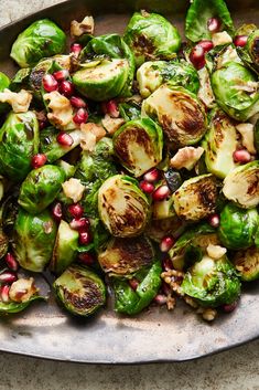 brussel sprouts with pomegranate and seeds on a plate