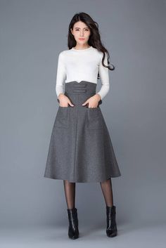 FEATURES Wool blend 25% wool, other fiber,nylon Polyester lining Back zipper closure Two pockets A-line Regular fit Below knee length Perfect for winter,spring,autumn More color SIZE Available in sizes XS-XXL How to choose size ? 1.Check your body measurement with instructions Gray Midi Skirt, Warm Skirt, Midi Skirt Winter, Custom Skirt, Midi Skirt Fall, Warm Skirts, Winter Skirts, Designer Skirt, Skirt Winter