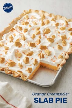 an orange creamsice slab pie on a white table