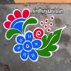 an image of colorful flowers painted on the ground with words that read sindurya aaalan