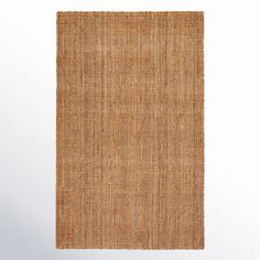 an area rug made out of jute