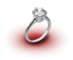 a diamond ring on a red background