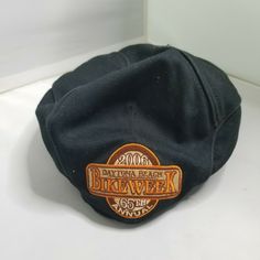 Retro NEWSBOY Daytona Beach 2006 BIKE WEEK Pageboy HAT CAP Condition is preowned, see photos.  Assume that all items were previously owned by a rottweiler who smokes, has a pet cat, and lives in a 100 year old house. Seriously though, we have no idea of the previous life of our products. All items are steam sanitized before shipping which does not always eliminate the prior owners habits. Please launder your item once you receive it- we DO NOT accept returns based on smells. We all prefer differ Pageboy Hat, 100 Year Old House, Bike Week, Daytona Beach, Pet Cat, Previous Life, Rottweiler, Hat Cap, Old House