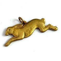 Rabbit Charm, Running Rabbit Charm, Brass Charm, Vintage Jewelry, Vintage Charm, Vintage Brass Charm, Animal Charm, Rabbit Jewelry by eVintique on Etsy Running Rabbit, Rabbit Jewelry, Custom Charm Bracelet, Morristown Nj, Bunny Necklace, Rabbit Charm, Rabbit Necklaces, Rabbit Pendant, Custom Charms