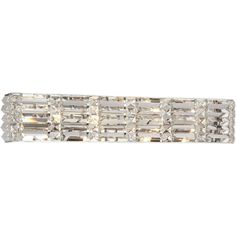 a wall light that is on the side of a white wall with crystal stones in it