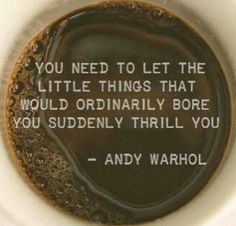 a cup of coffee with a quote on it