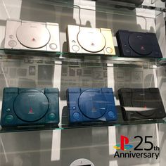 there are many different types of video game consoles on the display case in this store