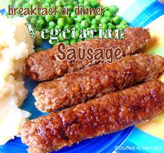 sausages, mashed potatoes and peas on a blue plate with the words breakfast or dinner vegetarian sausage