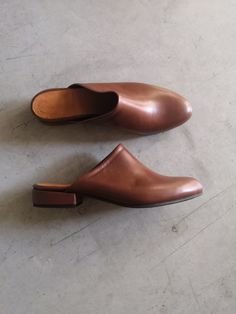 Slip Ons Women shoes, Leather Slides, Leather shoes women, Mule Shoes brown, rounded Toe shoes, Womens Leather Mules, brown Leather Mules Can be orderd in other colors. Leather covered heels. We use the finest leather and the most comfortable shoe shape. We use a manufactured durable sole so that you can enjoy the most out of these gorgeous shoes. All My shoes are handmade, created with careful attention to comfort, detail and style. Shoe Details: * Color - brown * Upper Materials: Fine Soft Lea Brown Leather Shoes With Closed Toe And Leather Lining, Brown Leather Closed Toe Shoes With Leather Lining, Brown Leather Shoes With Medium Width Flat Heel, Brown Leather Shoes With Flat Heel, Brown Slip-on Mules With Flat Heel, Brown Leather Shoes With Removable Insole, Classic Brown Mules With Stitched Sole, Brown Mules With Rubber Sole For Fall, Classic Brown Slip-on Mules