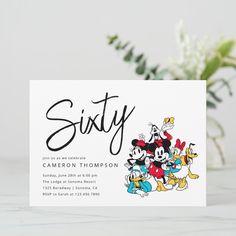 an image of a birthday party with mickey mouse and friends on the front, in black ink