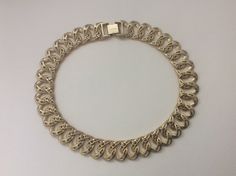 "Marked: Erwin Pearl. Copyright symbol P.E.P. Erwin Pearl satin gold, matte gold chain choker necklace approximately - 17.25\" with clasp x 3/4\". Very good to excellent condition." Gold Chain Link Choker With Curb Chain, Gold Curb Chain Choker, Gold Chain Necklace 16 Inch, Gold Chain Necklace, 16 Inch For Formal Occasions, Gold Chain Necklace With Gold Clasp For Formal Occasions, Copyright Symbol, Gold Chain Choker, Gold Satin, Chain Choker Necklace