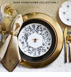 an image of a table setting with honeycombs on the plate and silverware