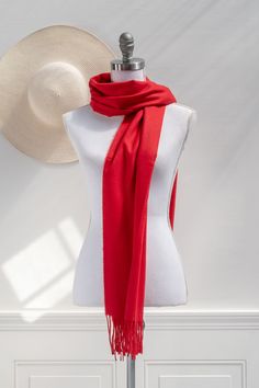 A must-have addition to your cold weather wardrobe, this simple-yet-chic scarf in a classic red will keep you cozy and stylish all season long. Please Note- This item is final sale only. . Details: 27" Wide x 71" Long 100% Polyester Imported Classic Solid Scarves For Fall, Classic Solid Color Scarves For Fall, Casual Red Winter Scarf, Red Casual Scarves For Fall, Casual Red Scarf For Fall, Red Winter Scarves For Cold Weather, Red Scarves For Winter Cold Weather, Elegant Red Scarf For Fall, Casual Red Scarf For Cold Weather